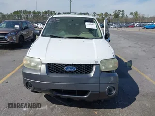 2005 Ford Escape XLT with VIN 1FMYU03165KA93495, listed as a IAAI auction lot 41821975 with 202,475 mi miles and . Bid and sale history available at DreamBid. Image 12.