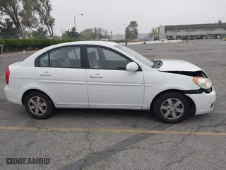 2009 Hyundai Accent Auto GLS with VIN KMHCN46C79U333109, listed as a IAAI auction lot 42023502 with 230,123 mi miles. Bid and sale history available at carsss.com. Image 13.