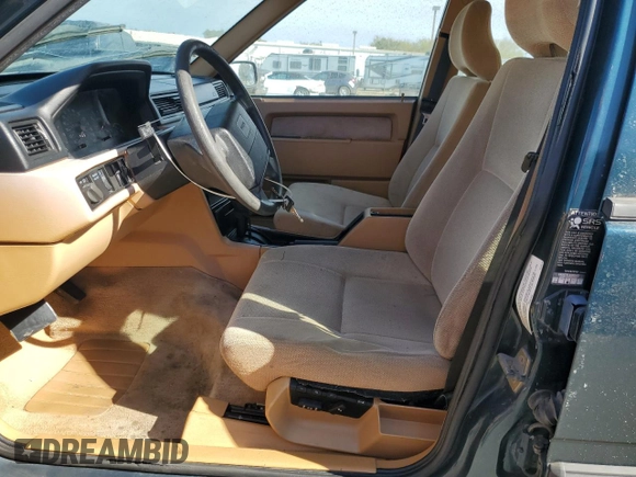1994 Volvo 900 z VIN YV1JS8615R1180199, wystawiony jako Copart lot #76126714 z przebiegiem 131 713 mil mil oraz Szkoda całkowita • Salvage title. Historia ofert i sprzedaży dostępna na DreamBid. Obrazek 7.