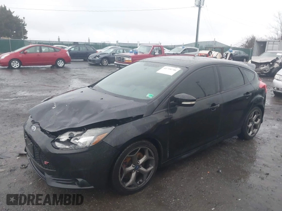 2014 Ford Focus ST with VIN 1FADP3L94EL180667, listed as a IAAI auction lot 41718746 with 141,574 mi miles and . Bid and sale history available at carsss.com. Image 17.