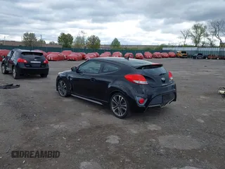 2016 Hyundai Veloster Turbo with VIN KMHTC6AE1GU264151, listed as a IAAI auction lot 42054383 with 92,378 mi miles. Bid and sale history available at carsss.com. Image 3.