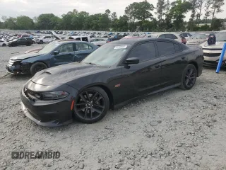 2019 Dodge Charger Scat Pack z VIN 2C3CDXGJ7KH697176, wystawiony jako Copart lot #53702845 z przebiegiem 76 988 mil mil oraz Szkoda całkowita • Salvage title. Historia ofert i sprzedaży dostępna na DreamBid. Obrazek 1.
