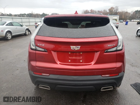 2022 Cadillac XT4 FWD Sport with VIN 1GYFZER43NF108145, listed as a Copart auction lot 83984054 with 36,603 mi miles and Salvage title. Bid and sale history available at DreamBid. Image 6.