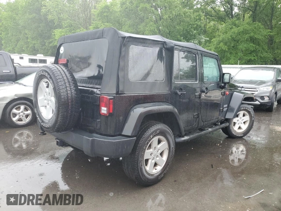 2017 Jeep Wrangler Unlimited Sport with VIN 1C4BJWDG8HL707809, listed as a Copart auction lot 57096085 with 34,959 mi miles and Salvage title. Bid and sale history available at DreamBid. Image 3.