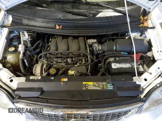 2003 Ford Windstar SEL z VIN 2FMZA53423BA17185, wystawiony jako Copart lot #82034114 z przebiegiem 64 807 mil mil oraz Szkoda całkowita • Salvage title. Historia ofert i sprzedaży dostępna na DreamBid. Obrazek 13.