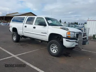 2005 GMC Sierra 2500HD SLE z VIN 1GTHK23245F887905, wystawiony jako IAAI lot #41680146 z przebiegiem 104 775 mil mil oraz . Historia ofert i sprzedaży dostępna na DreamBid. Obrazek 1.
