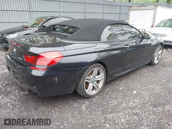 2017 BMW 6 Series 650i xDrive z VIN WBA6F7C52HD930816, wystawiony jako IAAI lot #42168478 z przebiegiem 89 191 mil mil oraz . Historia ofert i sprzedaży dostępna na DreamBid. Obrazek 4.