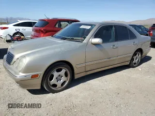 2001 Mercedes-Benz E-Class with VIN WDBJF70J71X052415, listed as a Copart auction lot 53858554 with 167,080 mi miles and Clean Title. Bid and sale history available at carsss.com. Image 1.