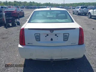 2008 Cadillac STS RWD z VIN 1G6DZ67A580168157, wystawiony jako IAAI lot #42133003 z przebiegiem 133 928 mil mil oraz . Historia ofert i sprzedaży dostępna na DreamBid. Obrazek 16.