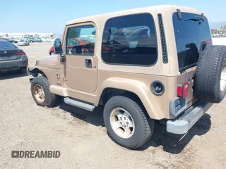 1999 Jeep Wrangler Sahara with VIN 1J4FY49S8XP462512, listed as a IAAI auction lot 42165052 with 146,135 mi miles and . Bid and sale history available at DreamBid. Image 3.