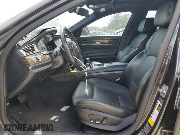 2012 BMW 7 Series 750i xDrive with VIN WBAKC6C5XCC397243, listed as a Copart auction lot 55388715 with 77,424 mi miles and Clean Title. Bid and sale history available at DreamBid. Image 7.
