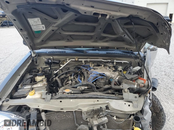 2003 Nissan Frontier XE with VIN 1N6ED27T73C433384, listed as a Copart auction lot 80153654 with 248,803 mi miles and Salvage title. Bid and sale history available at DreamBid. Image 13.