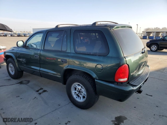 1999 Dodge Durango with VIN 1B4HR28Y5XF609605, listed as a Copart auction lot 41840835 with 115,272 mi miles and Salvage Title. Bid and sale history available at carsss.com. Image 2.