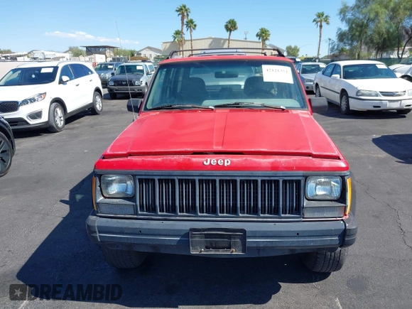1996 Jeep Cherokee Sport with VIN 1J4FT68S0TL225719, listed as a IAAI auction lot 42121351 with 237,602 mi miles and . Bid and sale history available at DreamBid. Image 6.