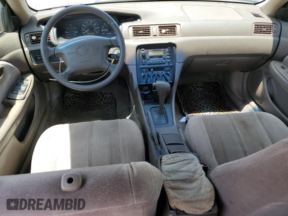 1999 Toyota Camry LE z VIN JT2BG22K6X0274398, wystawiony jako Copart lot #57263795 z przebiegiem 202 944 mil mil oraz Szkoda całkowita • Salvage title. Historia ofert i sprzedaży dostępna na DreamBid. Obrazek 8.