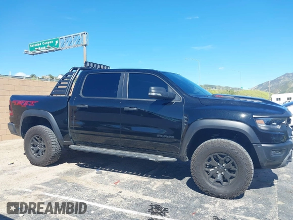 2022 Ram 1500 TRX with VIN 1C6SRFU95NN346475, listed as a IAAI auction lot 39200422 with 14,919 mi miles and . Bid and sale history available at DreamBid. Image 13.