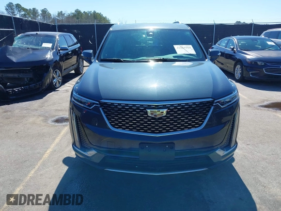 2021 Cadillac XT6 Premium Luxury with VIN 1GYKPERS0MZ110029, listed as a IAAI auction lot 41669104 with 58,890 mi miles and . Bid and sale history available at DreamBid. Image 12.