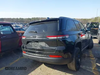 2024 Jeep Grand Cherokee Laredo X with VIN 1C4RJGAG7RC142320, listed as a IAAI auction lot 41709639 with 30,336 mi miles and . Bid and sale history available at DreamBid. Image 4.