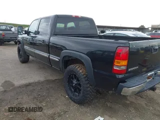2001 GMC Sierra 1500HD SLT z VIN 1GTGK13U91F137210, wystawiony jako IAAI lot #41600294 z przebiegiem 156 589 mil mil oraz . Historia ofert i sprzedaży dostępna na DreamBid. Obrazek 3.