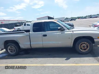 1999 Dodge Dakota SLT z VIN 1B7GL22X9XS258964, wystawiony jako IAAI lot #42309862 z przebiegiem 177 561 mil mil oraz . Historia ofert i sprzedaży dostępna na DreamBid. Obrazek 13.