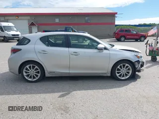 2012 Lexus CT 200h z VIN JTHKD5BH2C2108138, wystawiony jako IAAI lot #42359222 z przebiegiem 209 412 mil mil oraz . Historia ofert i sprzedaży dostępna na DreamBid. Obrazek 13.