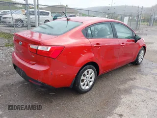 2013 Kia Rio LX with VIN KNADM4A34D6310495, listed as a IAAI auction lot 41986664 with 129,145 mi miles. Bid and sale history available at carsss.com. Image 4.