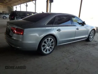 2012 Audi A8 with VIN WAURVAFD0CN028037, listed as a Copart auction lot 61004815 with 97,424 mi miles and Salvage title. Bid and sale history available at DreamBid. Image 3.