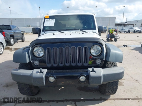 2015 Jeep Wrangler Willys Wheeler with VIN 1C4AJWAG0FL562536, listed as a IAAI auction lot 42384747 with 103,507 mi miles and . Bid and sale history available at DreamBid. Image 12.