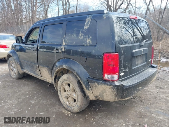 2008 Dodge Nitro SXT with VIN 1D8GU28K98W225158, listed as a IAAI auction lot 41911789 with 180,450 mi miles. Bid and sale history available at carsss.com. Image 3.