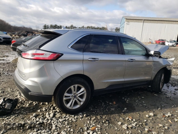 2020 Ford Edge SEL z VIN 2FMPK4J95LBA29912, wystawiony jako Copart lot #82968534 z przebiegiem 104 083 mil mil oraz Szkoda całkowita • Salvage title. Historia ofert i sprzedaży dostępna na DreamBid. Obrazek 3.