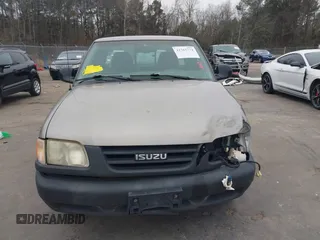 1998 Isuzu Hombre z VIN 1GGCS1943W8654177, wystawiony jako IAAI lot #41365774 z przebiegiem 136 253 mil mil oraz . Historia ofert i sprzedaży dostępna na DreamBid. Obrazek 12.