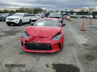 2023 Toyota GR86 with VIN JF1ZNBC14P8756375, listed as a Copart auction lot 82385244 with 56,912 mi miles and Salvage Title. Bid and sale history available at carsss.com. Image 10.