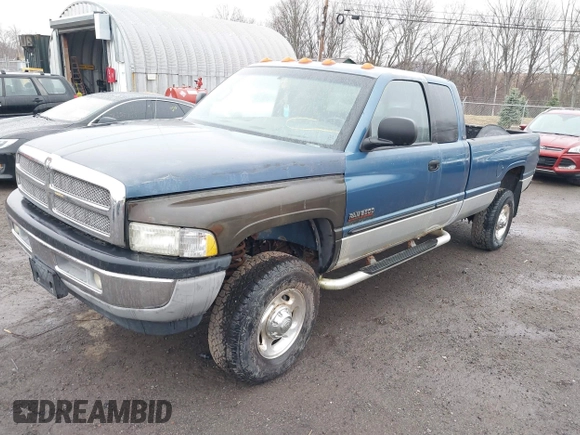 2002 Dodge 2500 with VIN 3B7KF236X2M293084, listed as a IAAI auction lot 41876449 with 164,418 mi miles and . Bid and sale history available at DreamBid. Image 2.