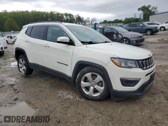 2020 Jeep Compass Latitude with VIN 3C4NJDBB8LT197354, listed as a Copart auction lot 52043745 with 82,189 mi miles and Salvage Title. Bid and sale history available at DreamBid. Image 4.