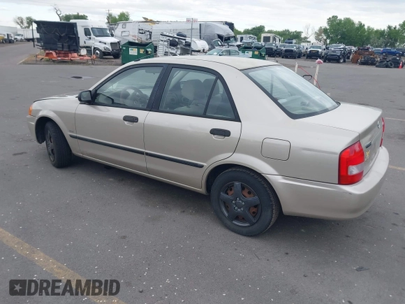 2000 Mazda Protege DX with VIN JM1BJ2227Y0237323, listed as a IAAI auction lot 42179683 with Not Provided miles and . Bid and sale history available at DreamBid. Image 3.