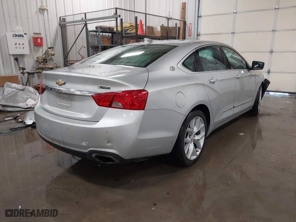 2018 Chevrolet Impala Premier with VIN 2G1125S36J9138869, listed as a IAAI auction lot 41207086 with 218,327 mi miles. Bid and sale history available at carsss.com. Image 4.