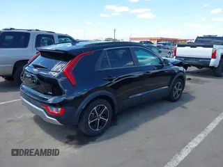 2023 Kia Niro EX with VIN KNDCR3LE1P5100018, listed as a IAAI auction lot 42033942 with 25,188 mi miles. Bid and sale history available at carsss.com. Image 4.