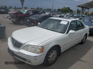 2004 Acura RL w/Navigation System z VIN JH4KA966X4C001584, wystawiony jako IAAI lot #42429042 z przebiegiem 290 258 mil mil oraz . Historia ofert i sprzedaży dostępna na DreamBid. Obrazek 6.