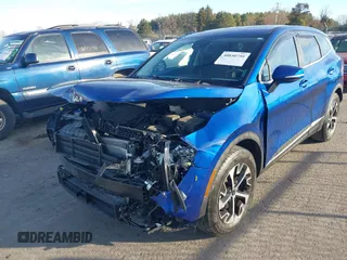 2023 Kia Sportage EX z VIN 5XYK33AF7PG043842, wystawiony jako IAAI lot #40850759 z przebiegiem 35 698 mil mil oraz . Historia ofert i sprzedaży dostępna na DreamBid. Obrazek 17.
