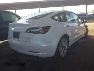 2021 Tesla Model 3 Long Range with VIN 5YJ3E1EBXMF868965, listed as a IAAI auction lot 41548119 with 43,087 mi miles and . Bid and sale history available at DreamBid. Image 4.