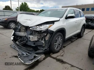 2019 Toyota Highlander SE z VIN 5TDJZRFH9KS618851, wystawiony jako Copart lot #62878265 z przebiegiem 96 626 mil mil oraz Szkoda całkowita • Salvage title. Historia ofert i sprzedaży dostępna na DreamBid. Obrazek 1.
