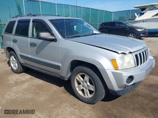 2005 Jeep Grand Cherokee Laredo with VIN 1J8GR48K25C667992, listed as a IAAI auction lot 42094246 with 281,242 mi miles. Bid and sale history available at carsss.com. Image 1.