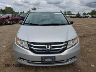 2014 Honda Odyssey LX z VIN 5FNRL5H21EB106600, wystawiony jako Copart lot #57875765 z przebiegiem 122 159 mil mil oraz Szkoda całkowita • Salvage title. Historia ofert i sprzedaży dostępna na DreamBid. Obrazek 5.