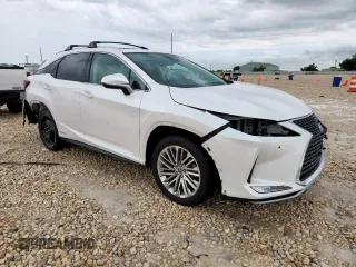 2021 Lexus RX 450h with VIN 2T2JGMDA2MC066759, listed as a Copart auction lot 59976055 with 66,344 mi miles and Salvage title. Bid and sale history available at DreamBid. Image 4.