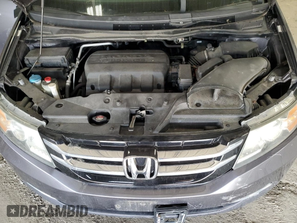 2015 Honda Odyssey LX с VIN 5FNRL5H25FB123692, выставлен на аукционе Copart как лот 57319855 с пробегом Не указан миль и На запчасти • Non repairable. История ставок и продаж доступна на DreamBid. Изображение 12.