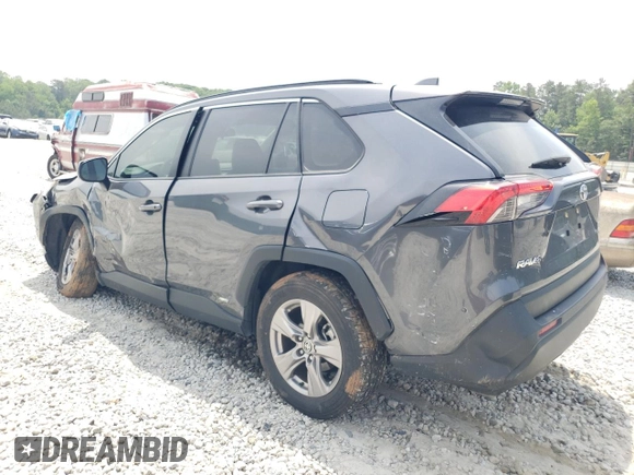 2023 Toyota RAV4 Hybrid LE with VIN JTMLWRFV8PD200078, listed as a Copart auction lot 57490185 with 67,321 mi miles and Salvage title. Bid and sale history available at DreamBid. Image 2.