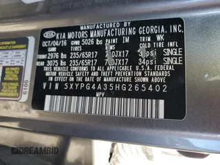2017 Kia Sorento LX z VIN 5XYPG4A35HG265402, wystawiony jako Copart lot #79926994 z przebiegiem Nie podano mil oraz Szkoda całkowita • Salvage title. Historia ofert i sprzedaży dostępna na DreamBid. Obrazek 12.