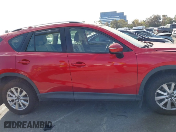 2016 Mazda CX-5 Sport with VIN JM3KE2BY4G0701442, listed as a IAAI auction lot 41682335 with 125,624 mi miles. Bid and sale history available at carsss.com. Image 14.
