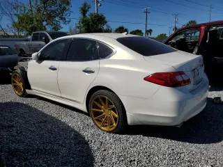 2014 Infiniti M37 with VIN JN1BY1AP3EM260267, listed as a Copart auction lot 47664255 with 61,689 mi miles and Salvage Title. Bid and sale history available at carsss.com. Image 2.