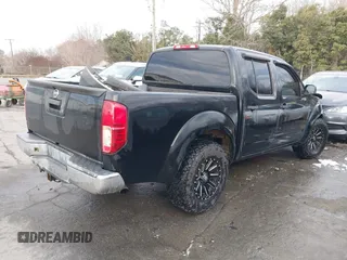 2014 Nissan Frontier SV with VIN 1N6AD0ER9EN715608, listed as a IAAI auction lot 41306919 with 181,107 mi miles and . Bid and sale history available at DreamBid. Image 4.